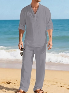 Close-up of grey linen shirt texture and breathable fabric for men on beach