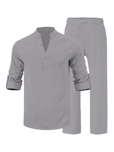 Detail of grey linen shirt collar with three buttons and textured breathable fabric