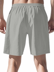 Rear view of men's grey breathable cotton linen shorts with an elastic waistband