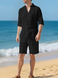 Men's casual black linen two-piece set featuring long-sleeve Henley shirt and beach shorts