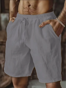 Detail showing elastic drawstring waistband on men's breathable dark grey linen shorts