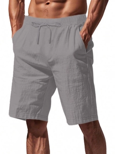 Detail view of men's grey linen blend casual shorts with drawstring elastic waistband
