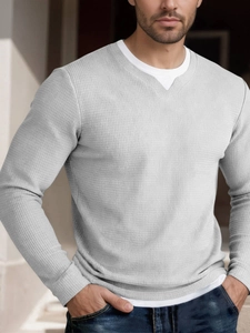 Close-up of light gray waffle texture fabric and layered double collar design