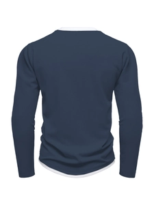 Detail view of the waffle texture fabric and navy blue double-layered hem on this men top