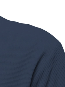 Macro view of navy blue waffle texture fabric and shoulder stitching on men's T-shirt