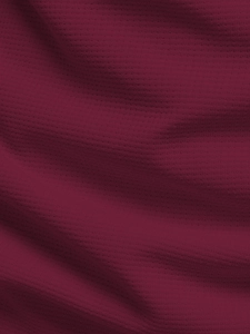 Close-up of premium burgundy waffle knit fabric texture on men's long sleeve tee
