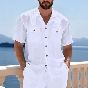 Men's relaxed white linen long sleeve shirt with classic collar and front pockets