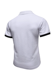 Detailed back view of men's white polo shirt featuring textured diamond knit pattern