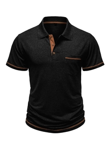 Detailed view of black polo shirt collar with brown contrast stitching and chest pocket