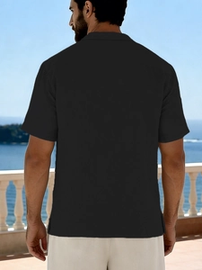 Rear view of casual black linen short sleeve shirt with collar and side slit details