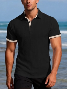 Detail of men's polo shirt with vertical stripe knit texture and beige collar contrast