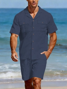 Detailed texture of blue linen cotton shirt with retro Cuban collar and dual chest pockets