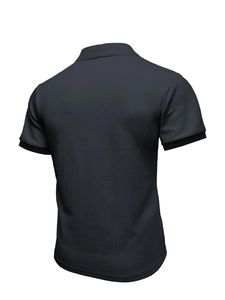 Detailed back view of men's polo shirt featuring vertical waffle knit texture in charcoal