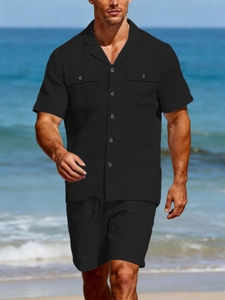 Detail of black linen men's leisure set with Cuban collar shirt and drawstring shorts