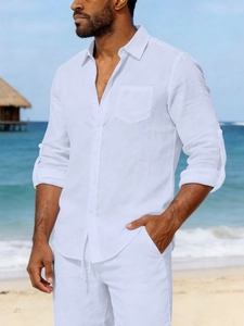Detailed texture of white linen shirt and matching beach shorts set for men