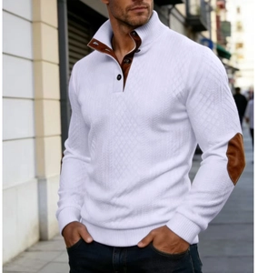 Detail of men's white knit sweater showing brown elbow patches and ribbed cuffs