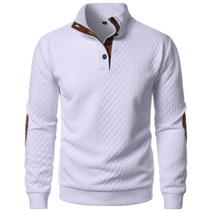 Detail of white waffle knit sweater featuring brown suede elbow patches and buttoned neck