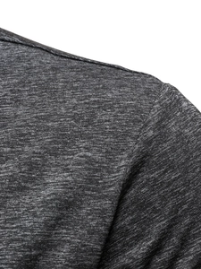 Close-up detail of dark grey melange knit fabric and shoulder stitching on a men's polo shirt