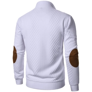 Detail of men's white knitted cardigan showing brown elbow patches and diamond texture