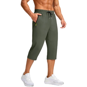 Men's olive green quick-dry sports capris with drawstring waist and zipper pockets