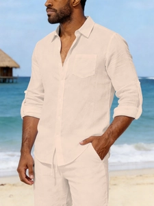 Close-up of beige linen men's leisure shirt and shorts set for beach vacations