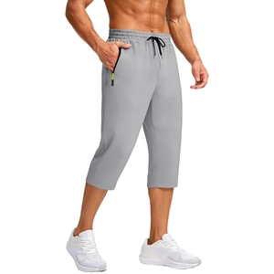 Men's lightweight quick-dry cropped sports pants in light grey with zipper pockets