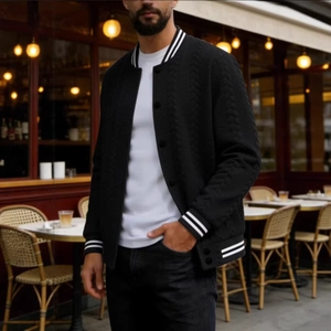Men's black jacquard baseball jacket with striped ribbed trims and textured knit fabric