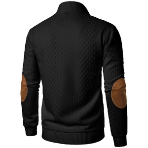 Detail view of men's black knit cardigan with brown suede elbow patches and ribbed trims
