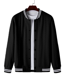 Detail of men's black cable-knit baseball jacket with striped ribbed collar and snap buttons