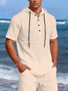 Detail of men's beige linen hooded t-shirt with black drawstring and button collar