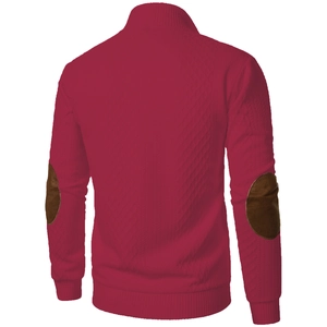 Detail of burgundy knit cardigan featuring classic diamond texture and brown elbow patches
