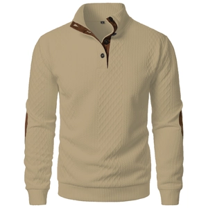 Detail of khaki knit cardigan with diamond texture and brown suede elbow patches
