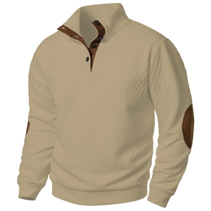 Detail of men's beige waffle knit pullover with stand collar and suede elbow patches
