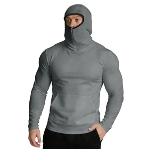 Detail view of the dark grey sun protection hoodie featuring an integrated face mask