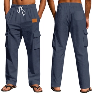 Détail du pantalon en coton et lin avec taille élastique et cordon de serrage blanc