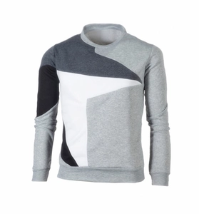Detailed flat lay of men's crewneck sweatshirt with geometric color block patterns