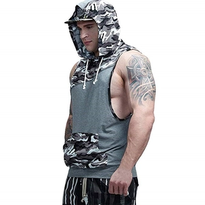 Detail of men's fitness hoodie vest with grey fabric and camouflage contrast panels