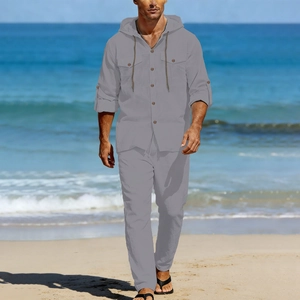 Close-up of gray linen texture on men's beach leisure suit with hood and pockets