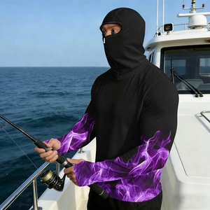 Detail of black fishing hoodie with purple flame sleeves on a sun-drenched yacht