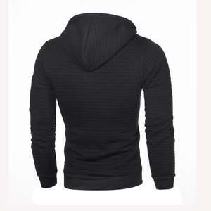 Vue arrière du sweat à capuche jacquard noir avec texture matelassée et bords-côtes