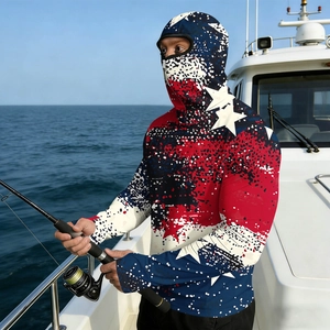 Man fishing on a yacht wearing a red, white, and blue camo sun protection hoodie with mask