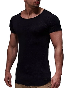 Detail of slim fit black t-shirt showing elastic fabric texture and raw edge crew neck