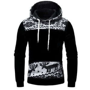 Detail of slim fit men's hoodie showing reindeer forest print and snowflake patterns