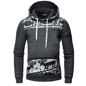 Detail of grey hoodie showing festive reindeer print and snowflake patterns on hood
