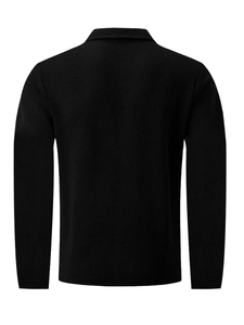 Rear view of black long-sleeve polo shirt with detailed waffle knit texture and ribbed collar