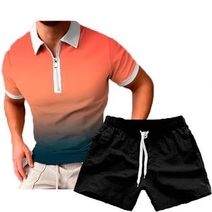 Detail of men's polo set with orange gradient zipper collar and black drawstring shorts