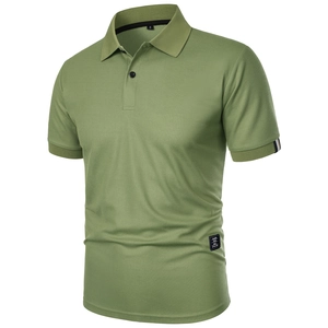 Detail of olive green polo shirt with pearl piqué texture and embroidered side label