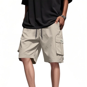Men's khaki multi-pocket cargo shorts with elastic drawstring waist in a loose fit