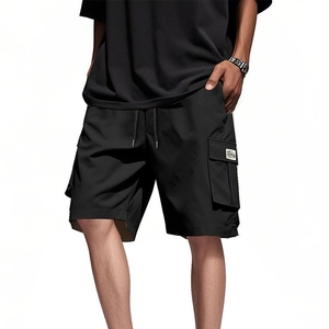 Men's loose black cargo shorts with drawstring waist and functional pockets for summer wear