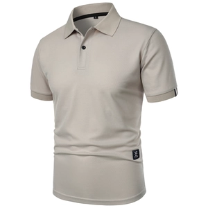 Close-up of khaki polo shirt featuring textured pique fabric and rib-knit striped cuffs